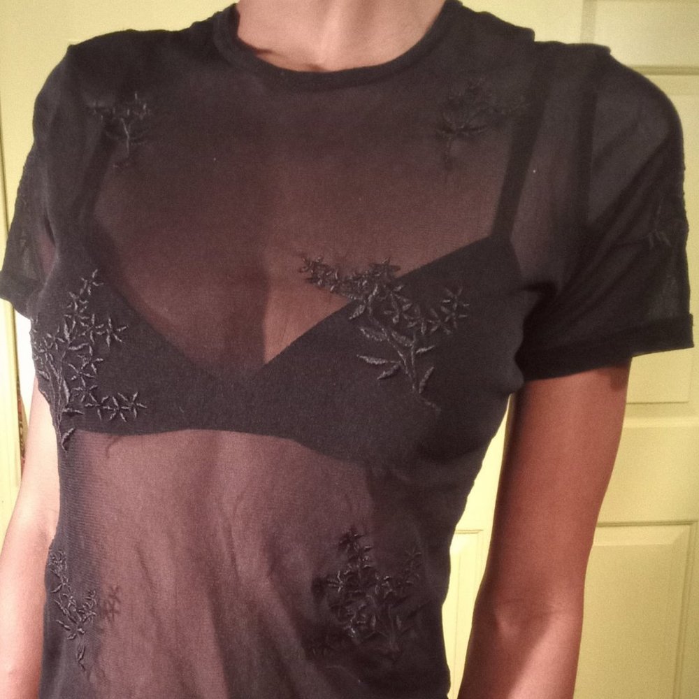 NY and Co. sheer and soft mesh top with floral embellishment. made in Macau.